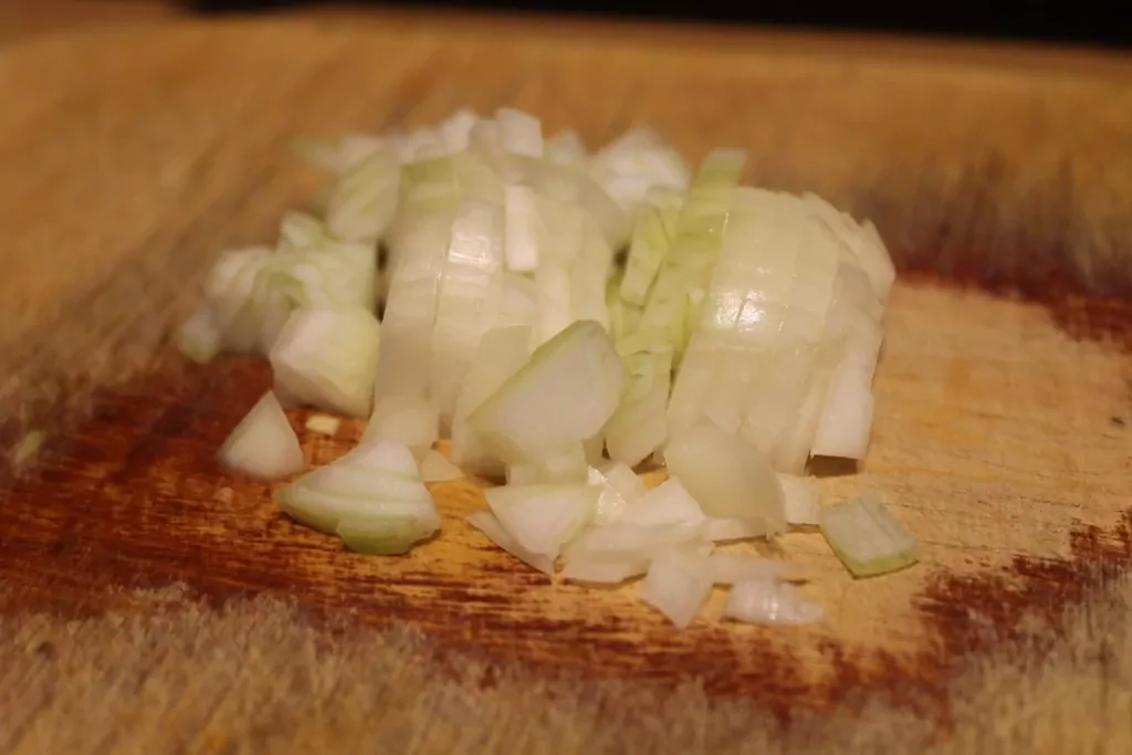 Grūbas ar olu un saulē kaltētiem tomātiem