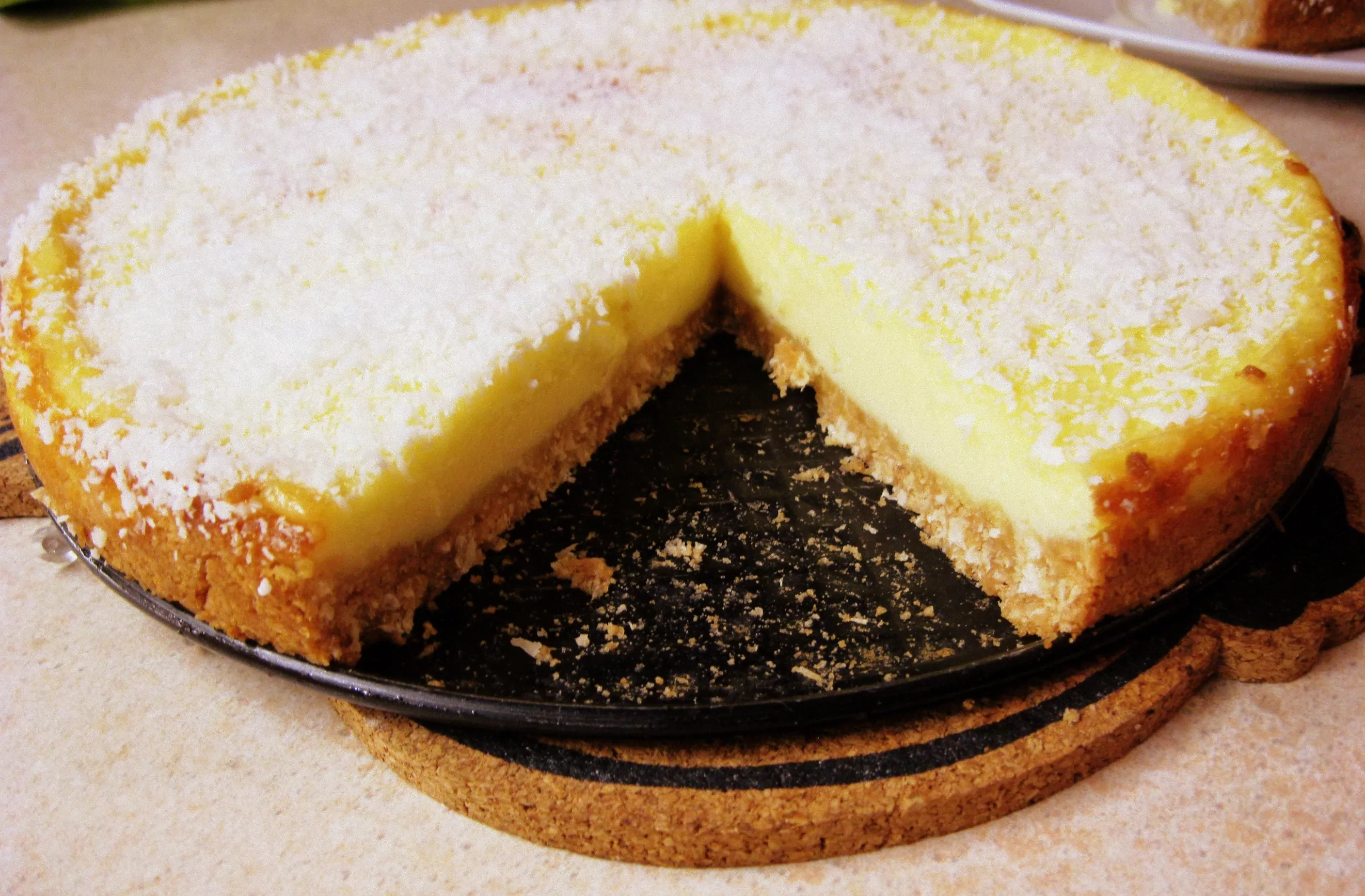 Citrinų, kokoso ir sūrio pyragas su sausainių pagrindu