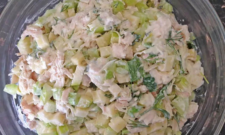 Quick chicken breast salat with cucumber, eggs, ham and cheese