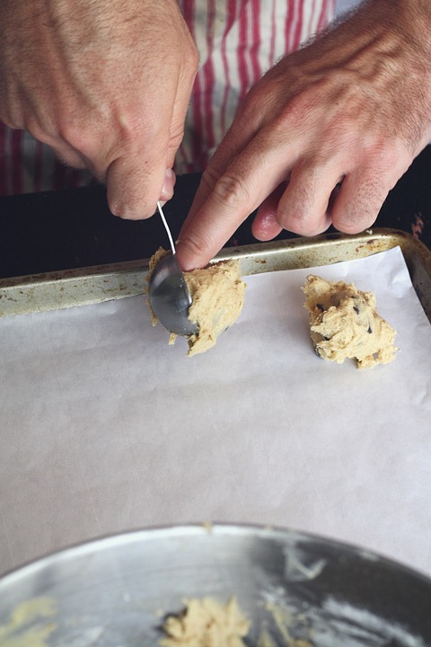 scooping vegan cookies dough