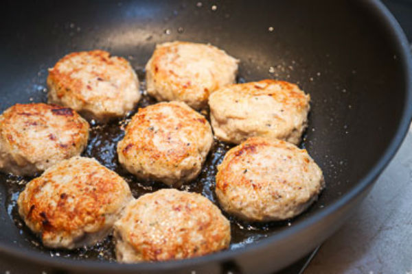fish cutlets in a pan