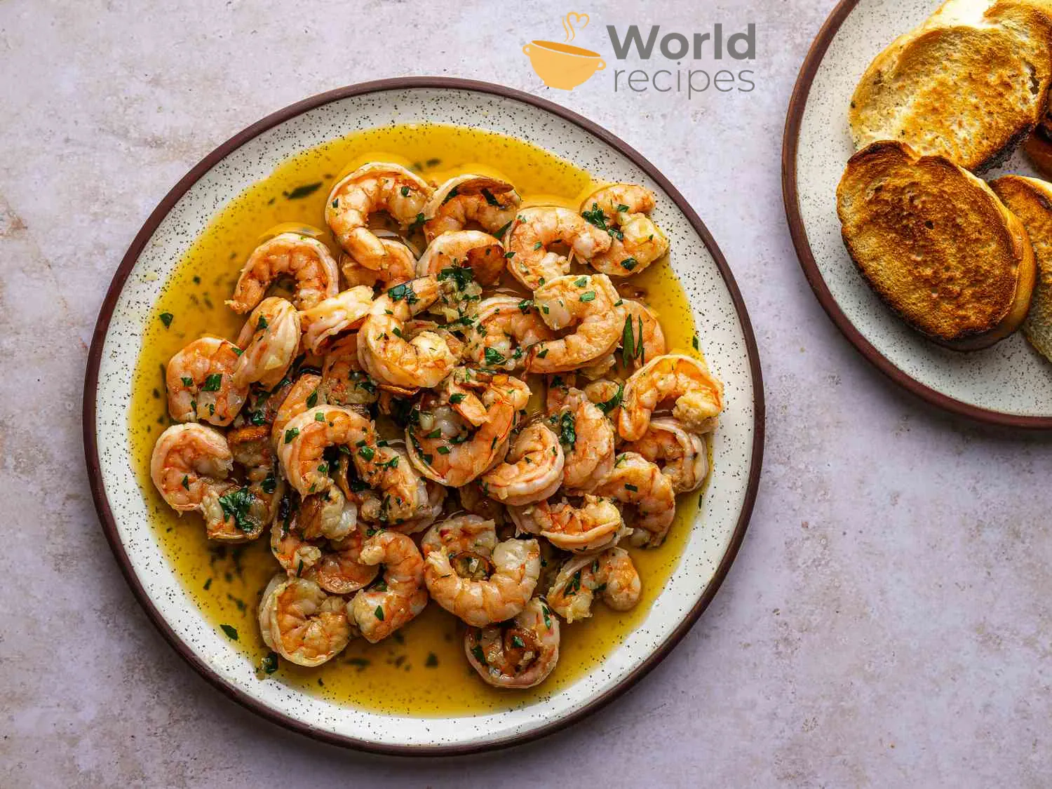 Greitos krevetės ispaniškai - su alyvuogių aliejumi ir česnaku (Gambas al ajillo)