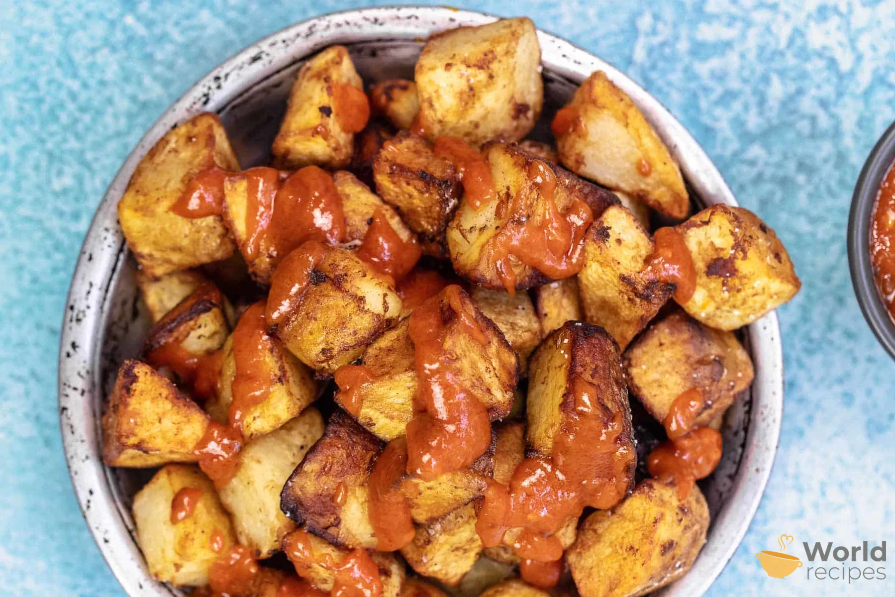 Patatas Bravas - Keptos bulvės ispaniškai su raudonu konservuotų pomidorų padažu