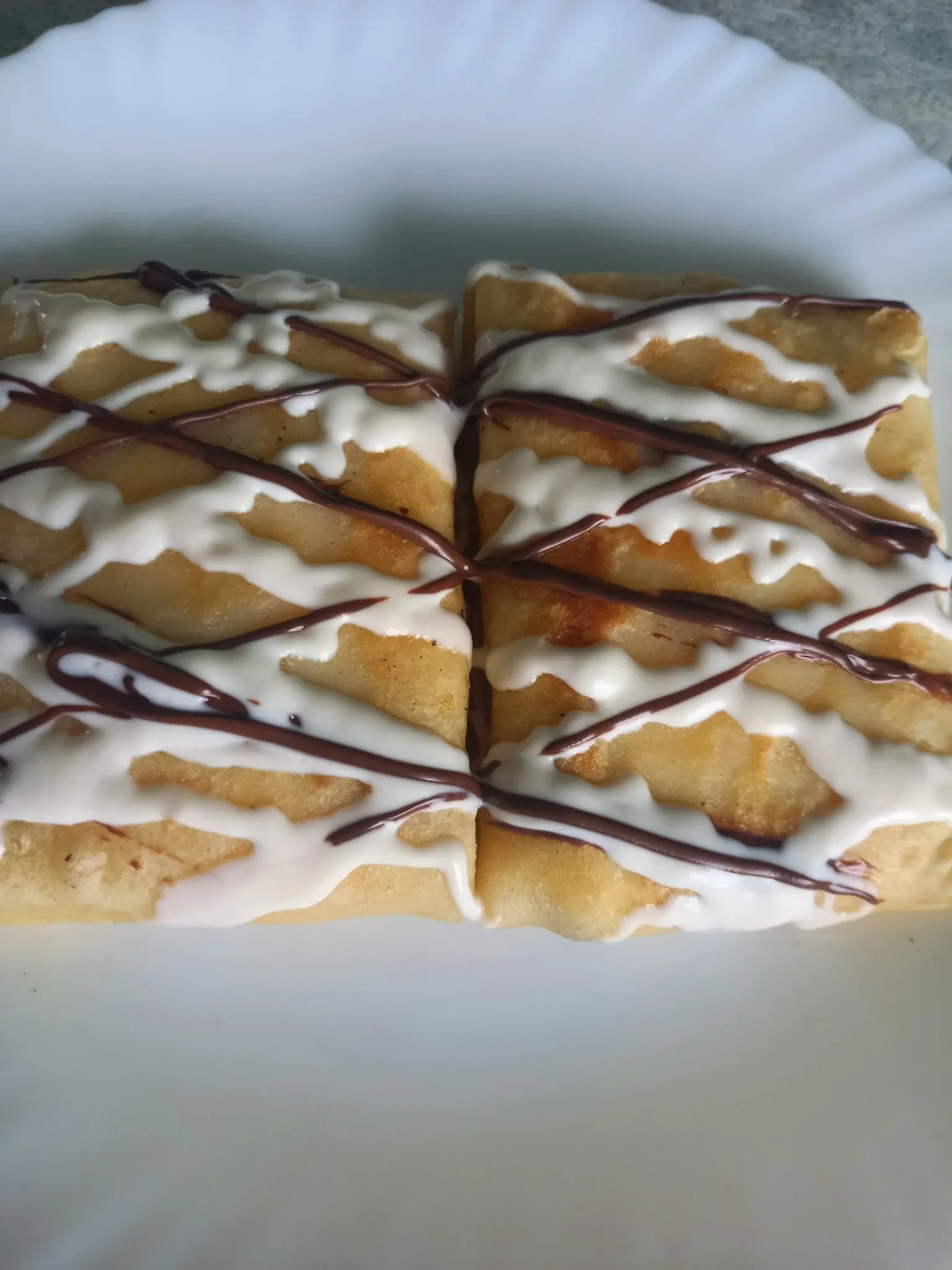 Lietiniai su varškės įdaru ir nutellos padažu